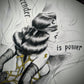 Impression embellie, numérotée et signée "Surrender is Power"